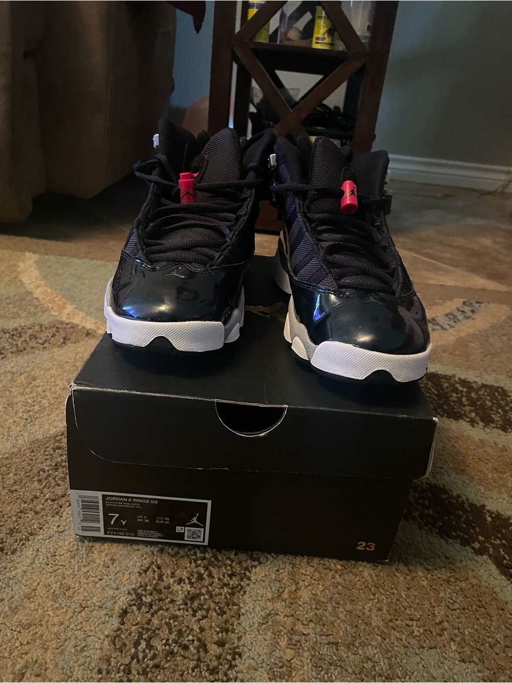 Jordan Kids Black and White Sneakers with Pink Pull Tab